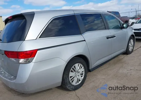 2014 Honda Odyssey Lx z USA, uszkodzony, nr VIN 5FNRL5H23EB016316